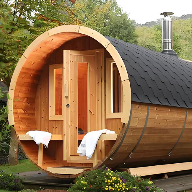 Backyard wooden barrel sauna, an outdoor round cabin used for hot spring vacations, thermotherapy, steam experiences, and traditional sauna indoors Hover Image